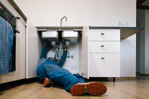 Professional Drain Cleaning technician working in Barrington, RI